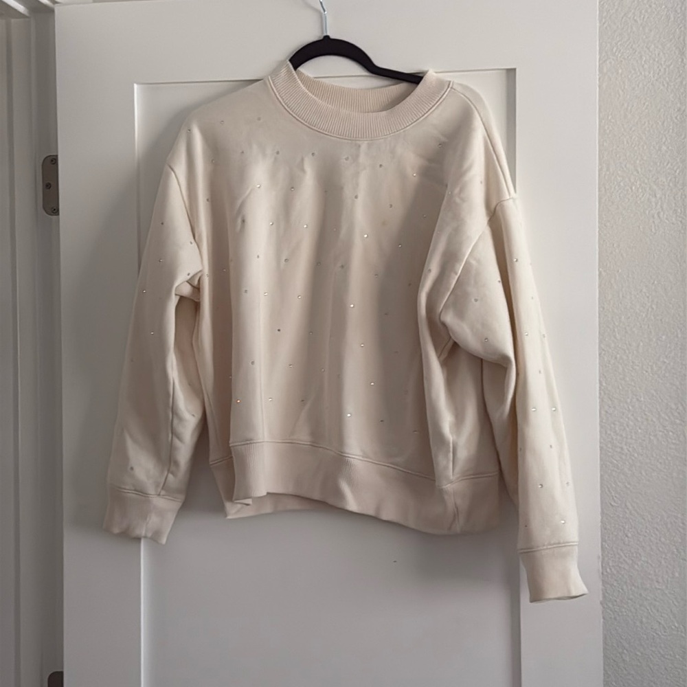 Tan crew neck sweater with rhinestones